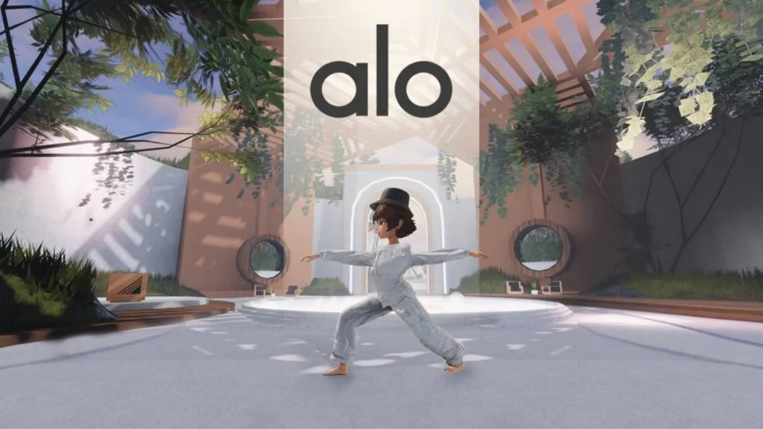 Animated character in gray workout clothes does a yoga pose in a modern, open-air space with plants and skylights. The word alo is displayed above in large letters.